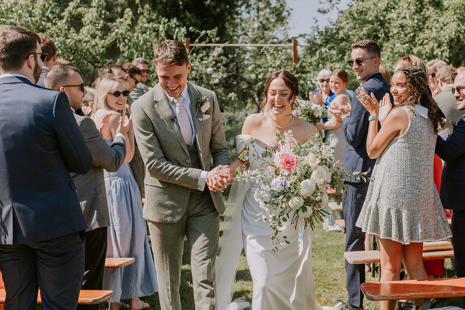 outdoor wedding ceremony in the orchard at The Secret Barn, Petal and Feast